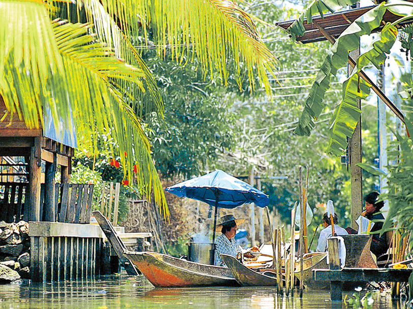 [Translate to Französisch:] Teil Ihrer Asien Rundreise in Bangkok: Bootsfahrt auf den Klongs